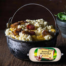 Traditional Branza de Burduf cheese from De la ferma, showcasing fresh, creamy lactate cheese in a rustic setting.